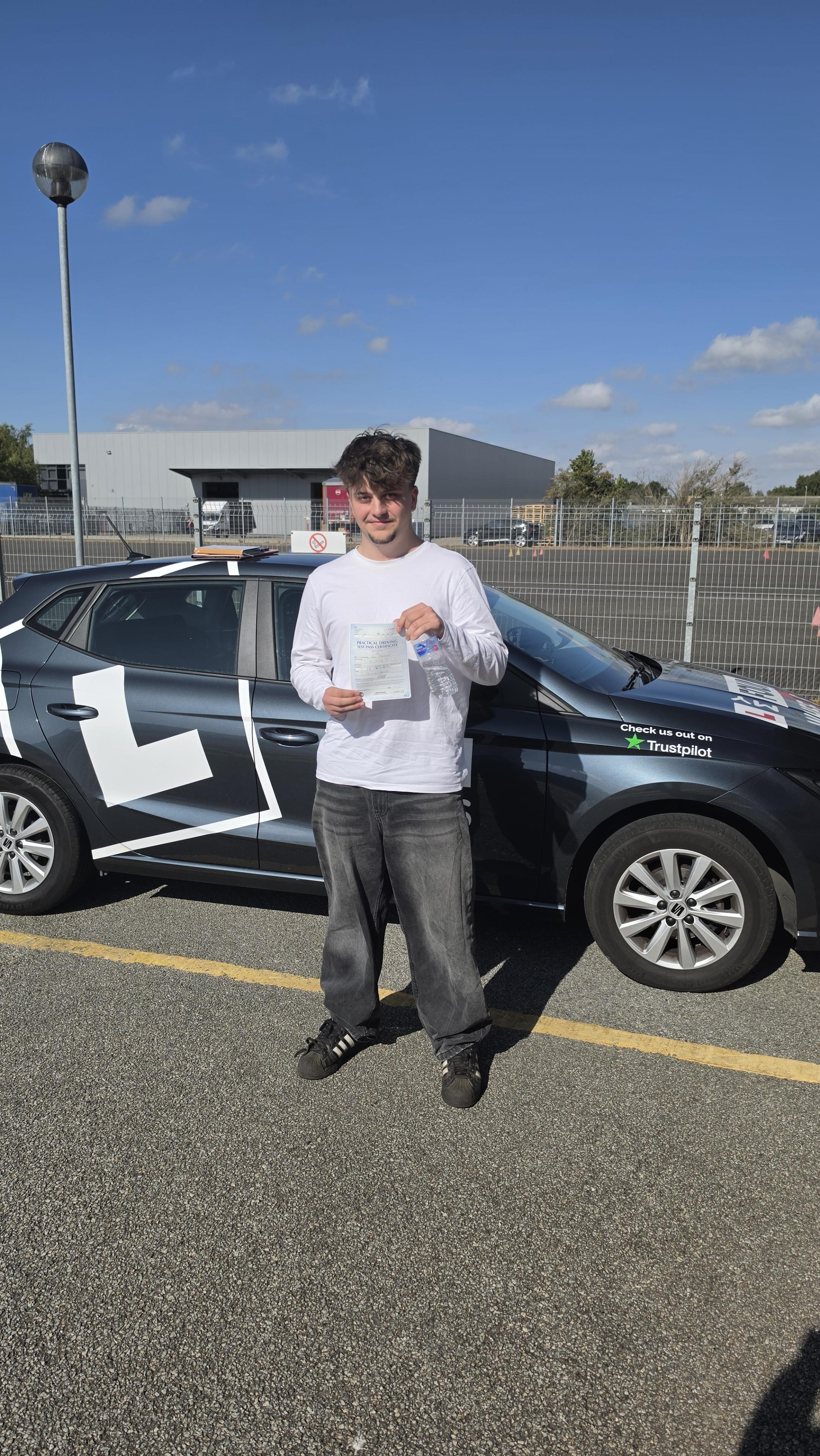 A JoStef Driving pupil celebrating passing their driving test